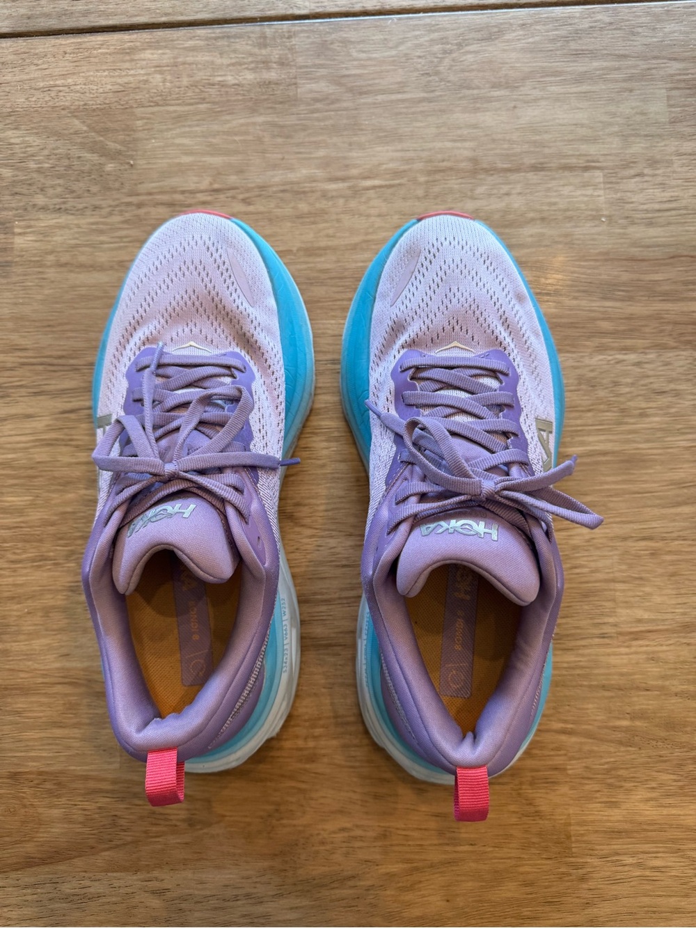 Hoka Women’s Lavender Running Shoes with Blue Midsole and Pink Pull Tab